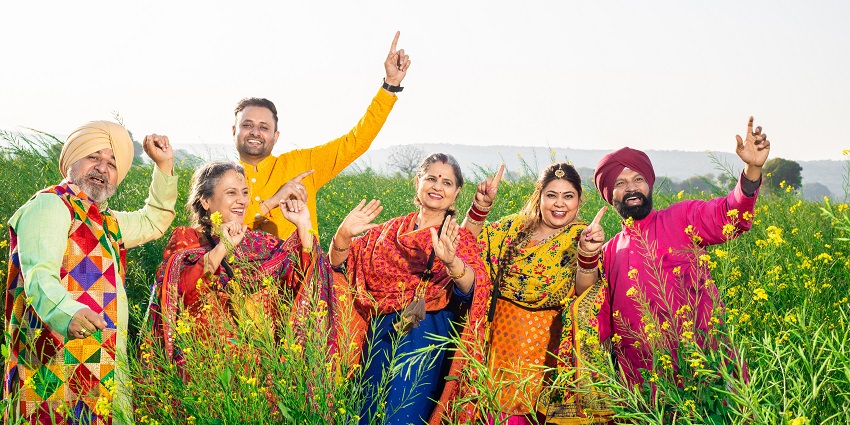 Punjabi men and women during Baisakhi festival - famous festivals in Jammu and Kashmir