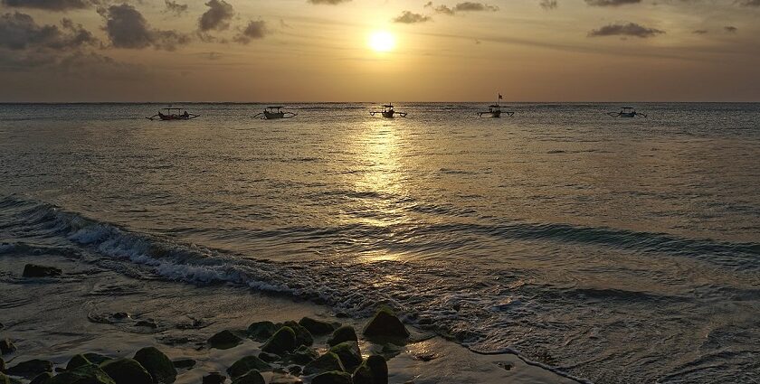 A picture of a beach in Bali during a beautiful sunset making it a golden hour