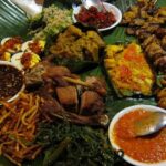 A picture of traditional Balinese food served on a Banana leaf