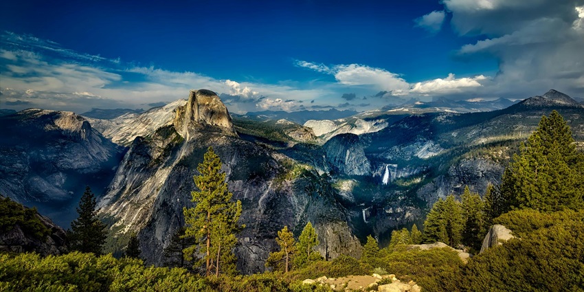 View from Balpakram National Park featuring rugged cliffs, lush forests, and diverse wildlife.