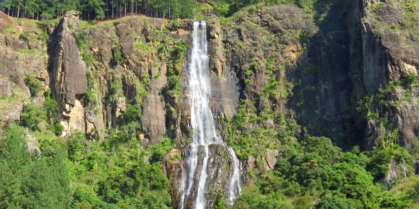 Bambarakanda Waterfall, Sri Lanka's tallest, cascades through lush greenery of Hills.
