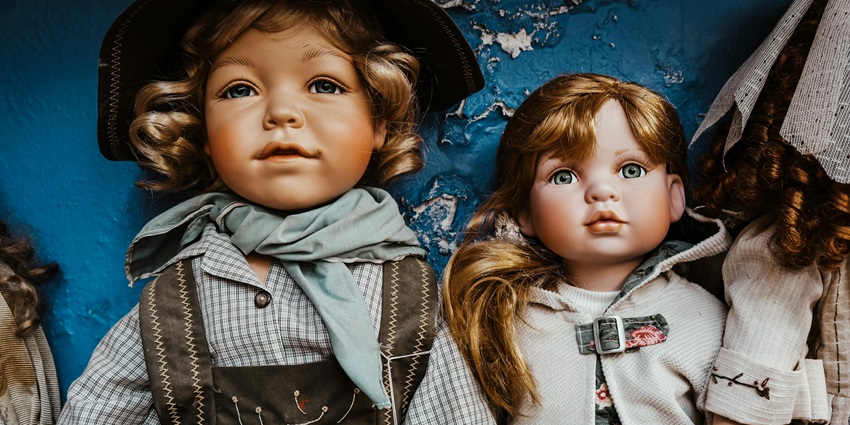 Image of Vintage Porcelain Dolls with Rustic Attire - similar to the Bangkok Doll Museum