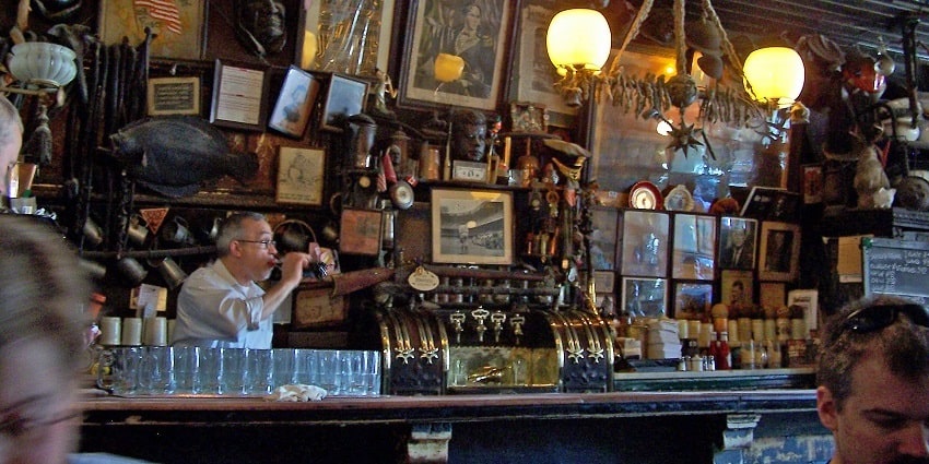 A picture of people enjoying their drinks at a bar