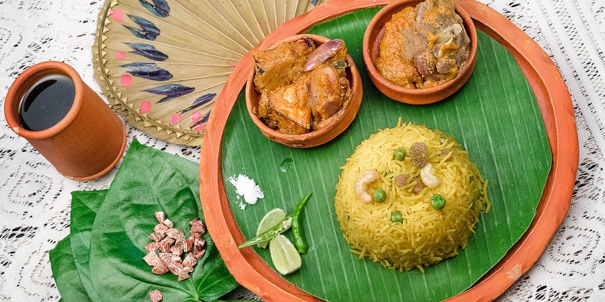Bengali thali with peas pulao - enjoy during Jorapokhar, one of the best summer festivals