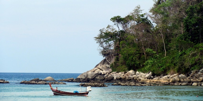 A panoramic view from Kata Beach overlooking the Andaman Sea in Phuket, Thailand.