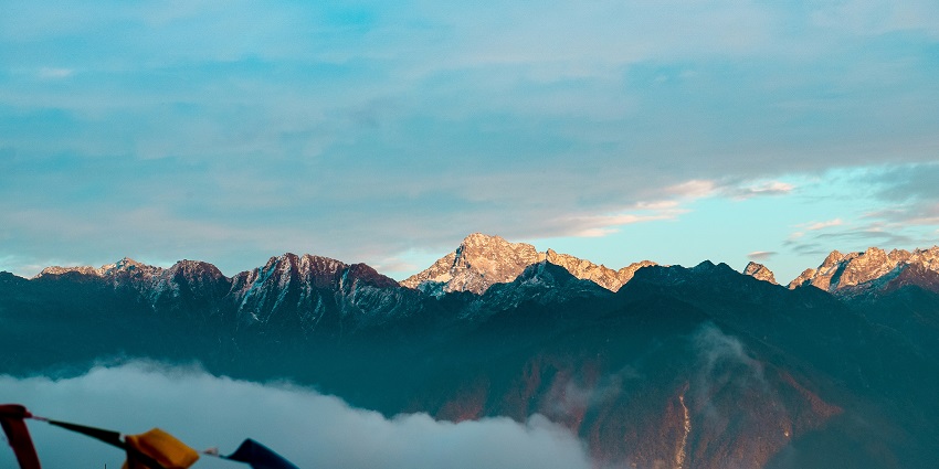 A breathtaking view of Arunachal Pradesh snow-covered mountains during the daytime.
