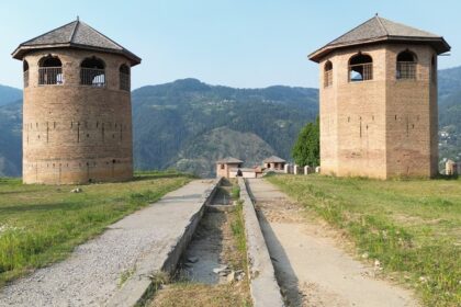 A scenic view of the Bhaderwah Fort with its two castles on either side