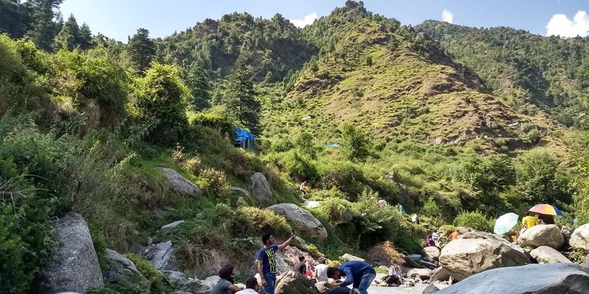 Image of Bhagsu waterfalls Macleodganj ,Himachal pradesh - tourist enjoying