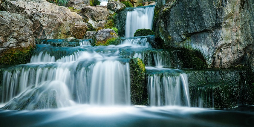 An idyllic view of glistening waters falling down from the rocky cliffs in Andhra Pradesh.