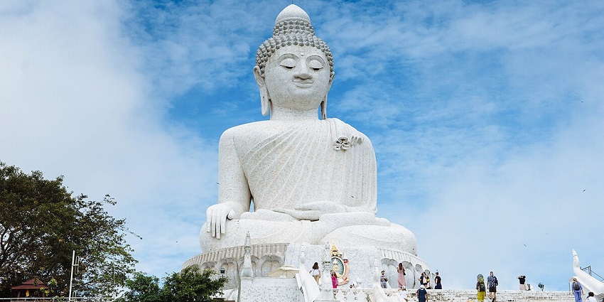 Iconic beautiful image of the while marble statues of Buddha in the city of Phuket