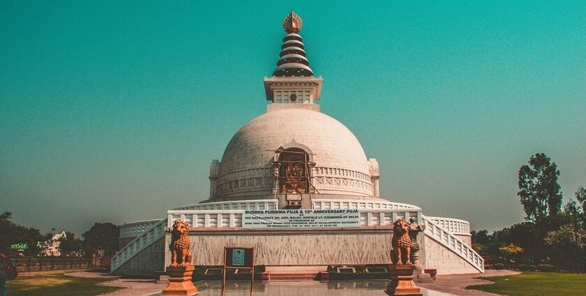 A picture of a peace pagoda located in the middle of the Indraprastha Park in Delhi on a sunny day