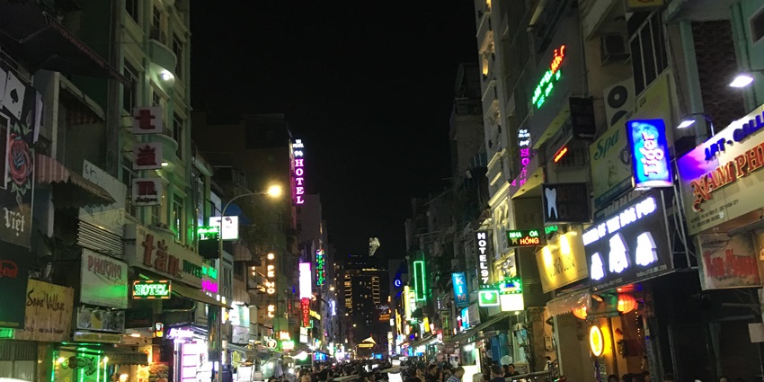 A view of the bustling Bui Vien Street, a hotspot to relish Vietnam nightlife for singles.