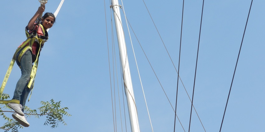 Tourists experiencing the adrenaline-pumping Bungee Rocket ride - one of the things to do in Solang Valley.
