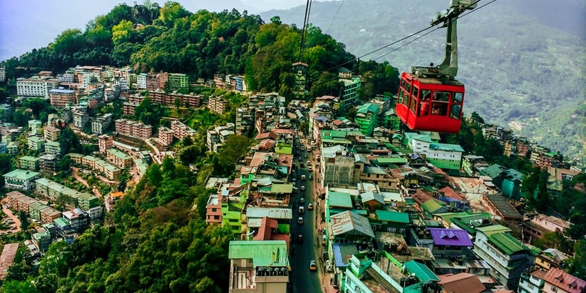 Witness the breathtaking view with a cable car ride, one of the things to do in Gangtok.