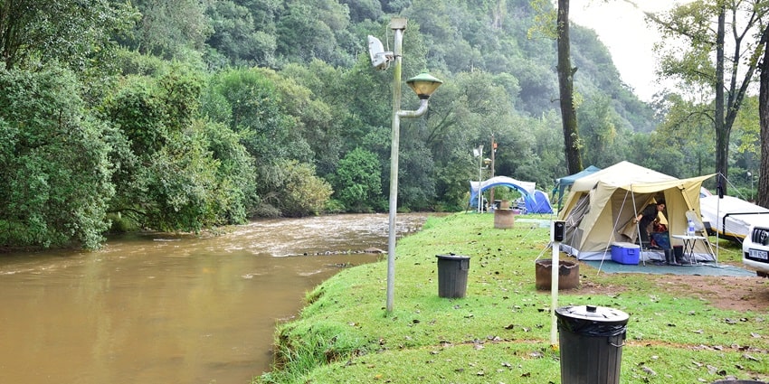 Camp near the river surrounded by mountains - best places for camping in Sonmarg