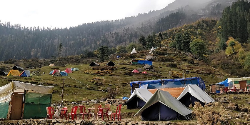 Tents spread across a mountain top for camping