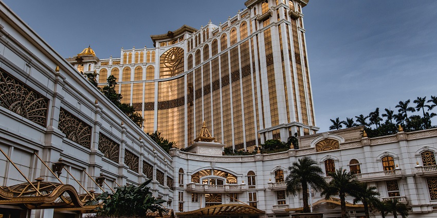 A glimpse of the Casino Hotel featuring a majestic building adorned with golden accents.