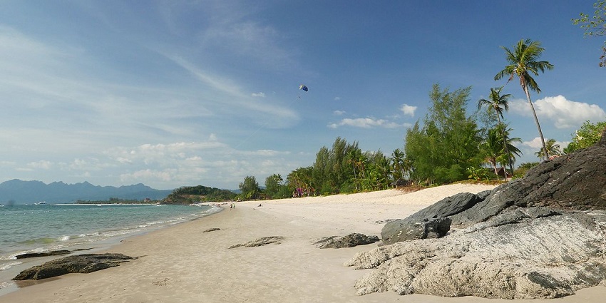 Sit back and relax at the pristine Cenang Beach, a beautiful place in Malaysia.