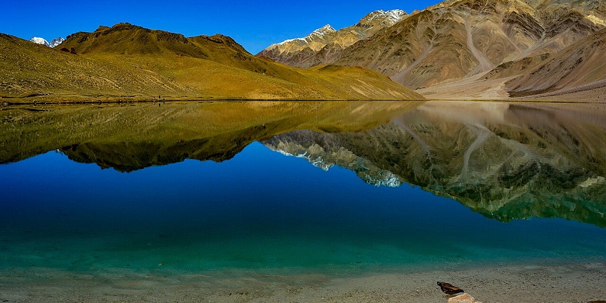 Enjoy trekking in Himachal Pradesh at the famous Chandratal Lake Trek in Spiti Valley.