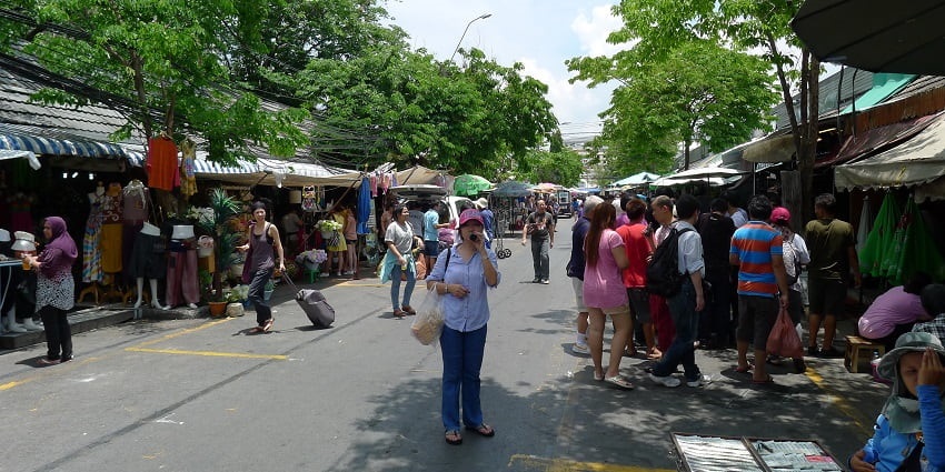 Take strolls at the vibrant streets of Chatuchak Weekend Market in Bangkok, Thailand.