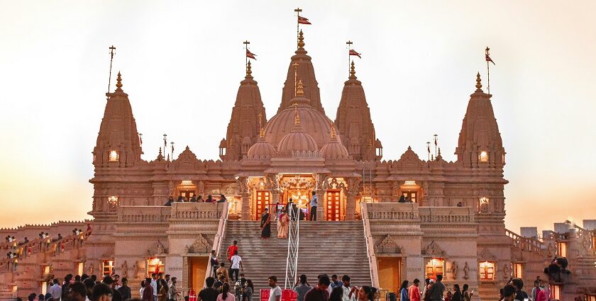 Panoramic image of a beautiful hindu temple and devotees outside the vicinity