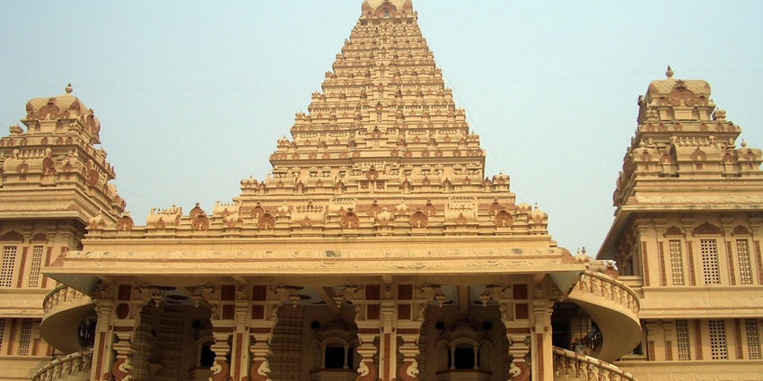 A frontal view of the entrance to an old Hindu temple built using traditional architecture
