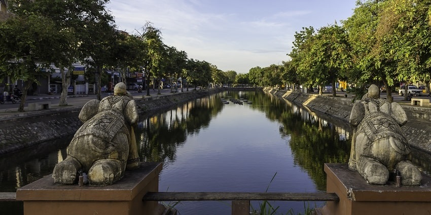 Indulge in the festive activities at the Chiang Mai Moat, Thailand for a fun experience.