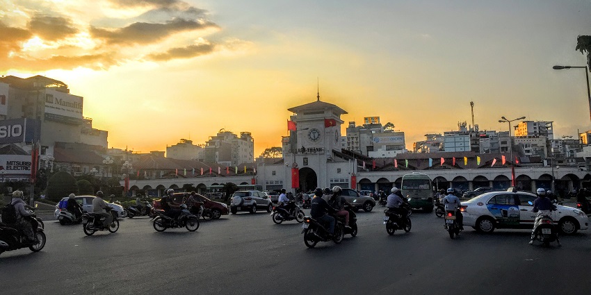 Ben Thanh Market in Ho Chi Minh City bustling with activity and shoppers.