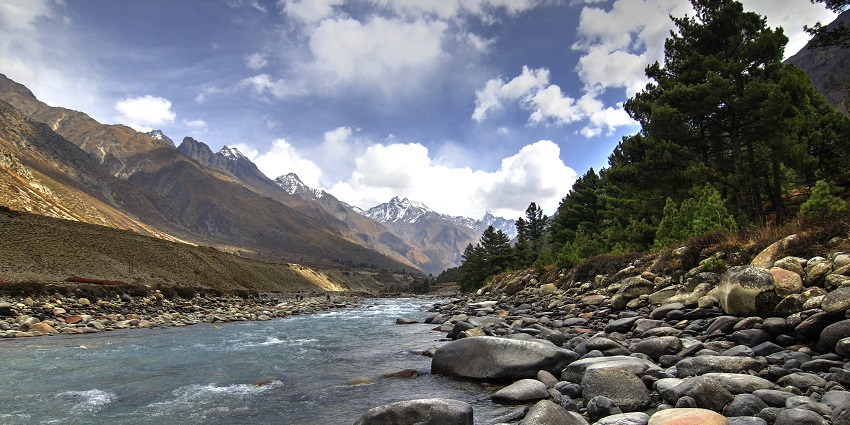 Baspa river flowing through Chitkul, a top place to see in Himachal in August