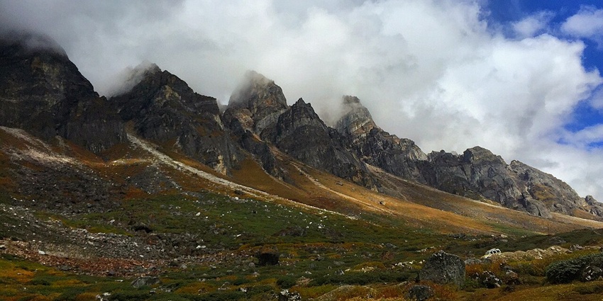 A picture of stunning plateaus in Sikkim, under a sky with a dense cover of clouds