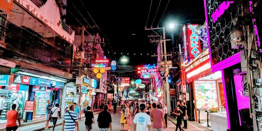 Cicada Market is one of the best places to explore souvenir shops as dusk falls.