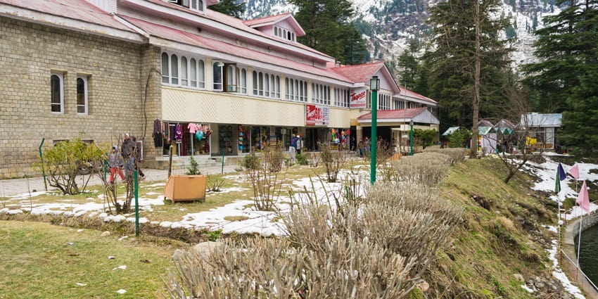 Tourists roaming around the club house, a destination for people to explore the retail aspect of the city