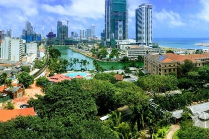 A scenic view of the Colombo skyline in Sri Lanka with its lush greenery and majestic buildings