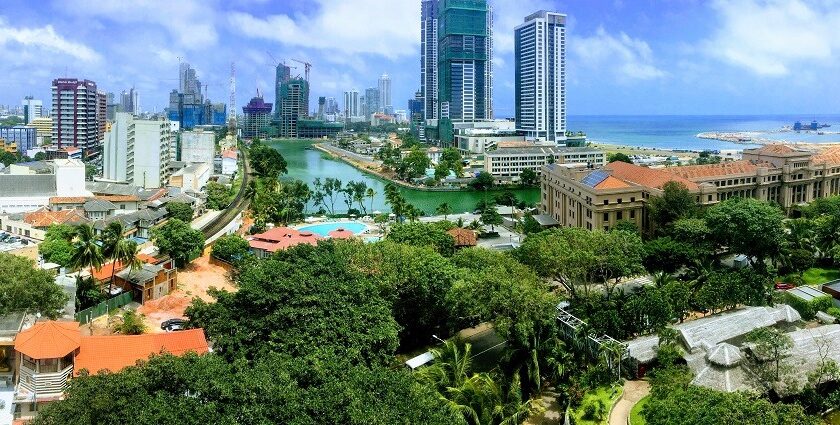 A scenic view of the Colombo skyline in Sri Lanka with its lush greenery and majestic buildings