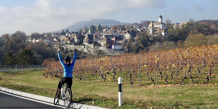 Beautiful snapshot of a cyclist amidst the valley of Peak–Best things to do in Manali