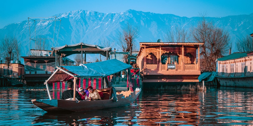 Dal Lake is a scenic lake in Kashmir where you can enjoy shikara rides and houseboat stays