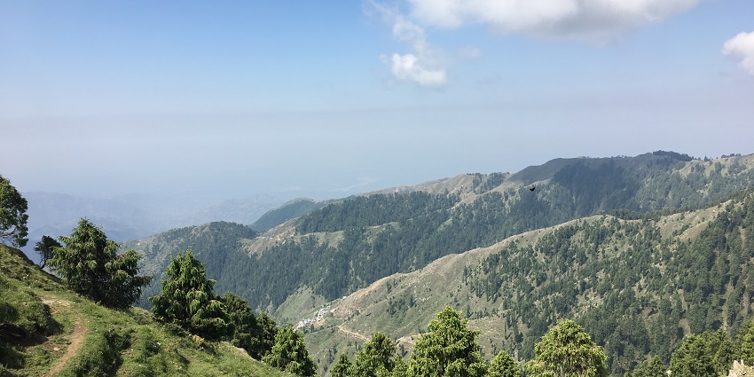 A picture showing the tall green hills of Dalhousie on a bright sunny day