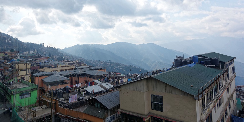 Top hill view in Darjeeling offering panoramic vistas of the Himalayan range and lush valleys.