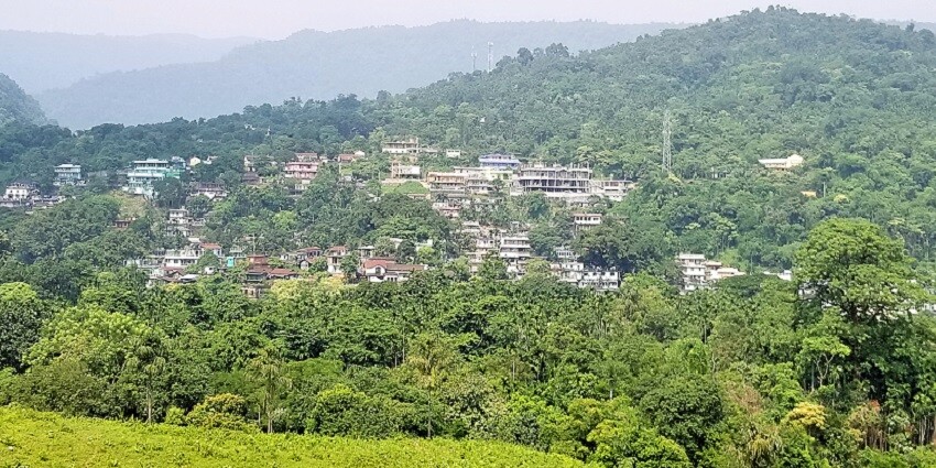 A glimpse of Dawki Bazaar and households from the Bangladesh side - places to visit in Meghalaya
