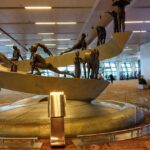 The sculpture of a man doing surya namaskar is placed inside the Delhi airport (IGI).