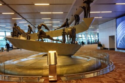 The sculpture of a man doing surya namaskar is placed inside the Delhi airport (IGI).