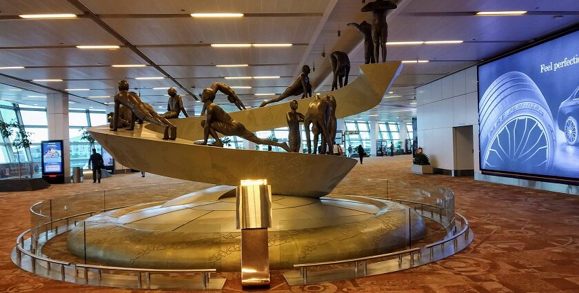 The sculpture of a man doing surya namaskar is placed inside the Delhi airport (IGI).