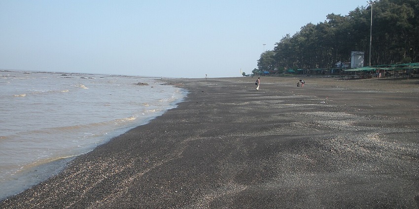A glimpse of ash-grey shorelines and glistening waters of the famous Devka Beach.
