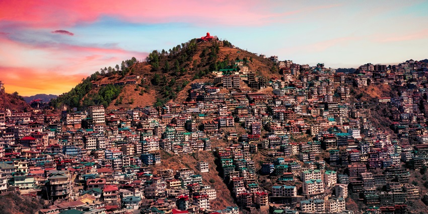 The scenic aerial view of a city located on a hill in the foothills of the Himalayas