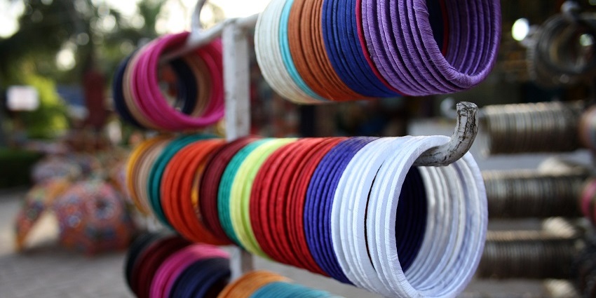 One of the best places for a fun Delhi trip is Dilli Haat where you can pick up cultural handicrafts