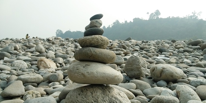 A view of stones stacked upon each other at the hills of Dima Hasao district in Panimur.