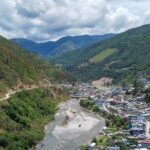 A breathtaking panorama of Valleys, featuring verdant hills - places to visit in Dirang.