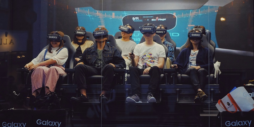 View of a group of people enjoying the virtual reality experience at the airport