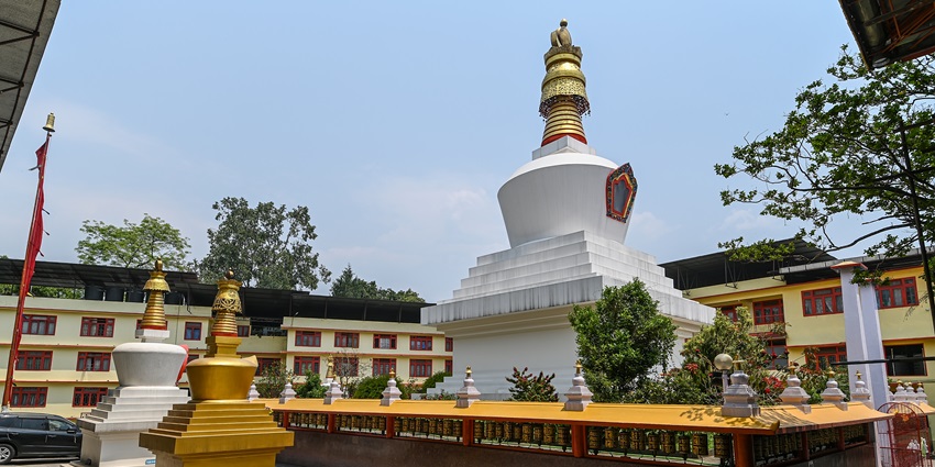 Do Drul Chorten stupa in Gangtok, Sikkim, featuring golden spire and prayer wheels