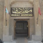 An image of the Dubai museum entrance at historic Al Fahidi Fort, the oldest building.